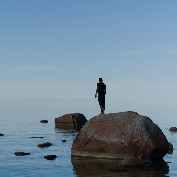 Human on rock