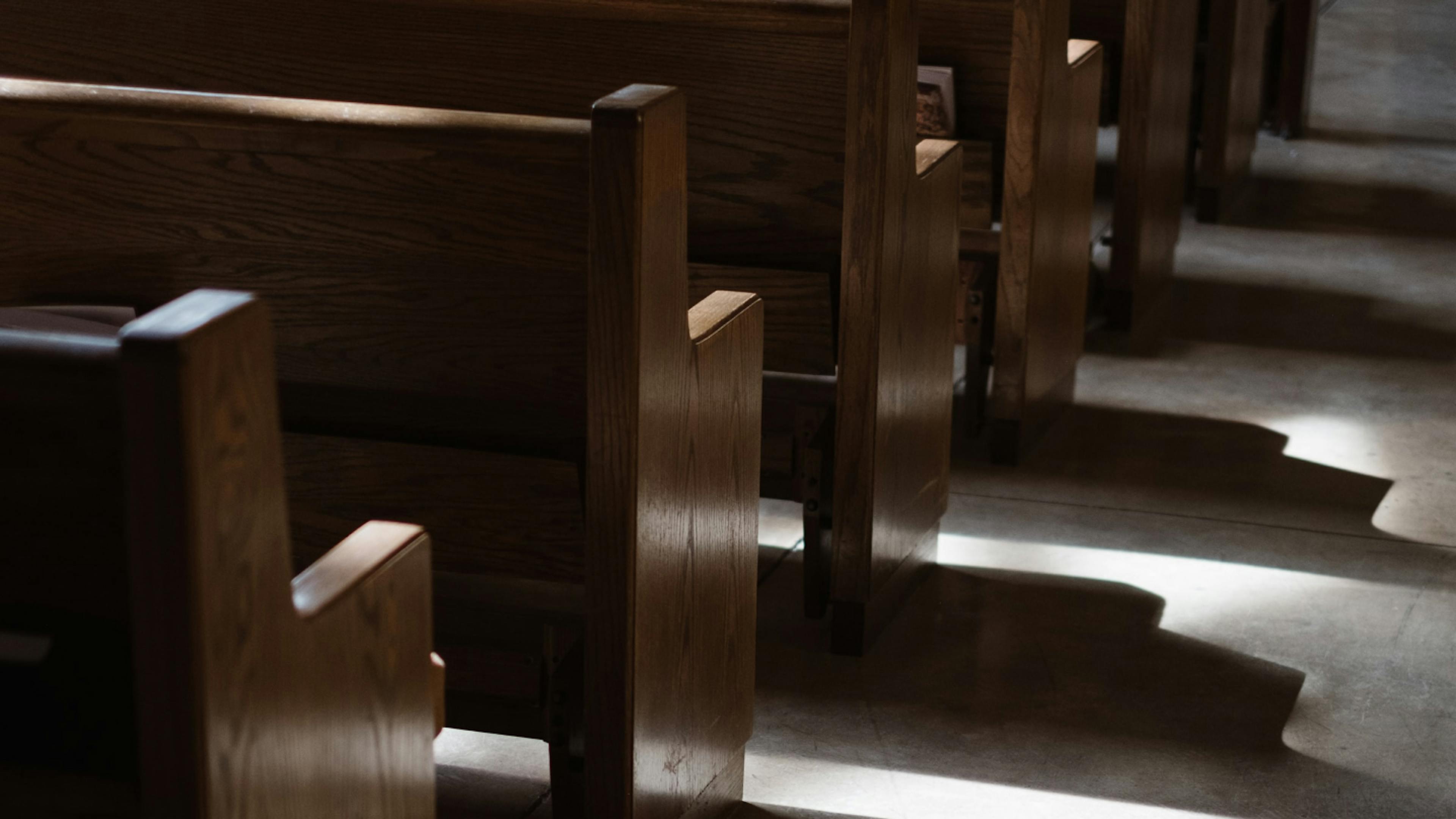 Wooden pews in a pentecostal church.