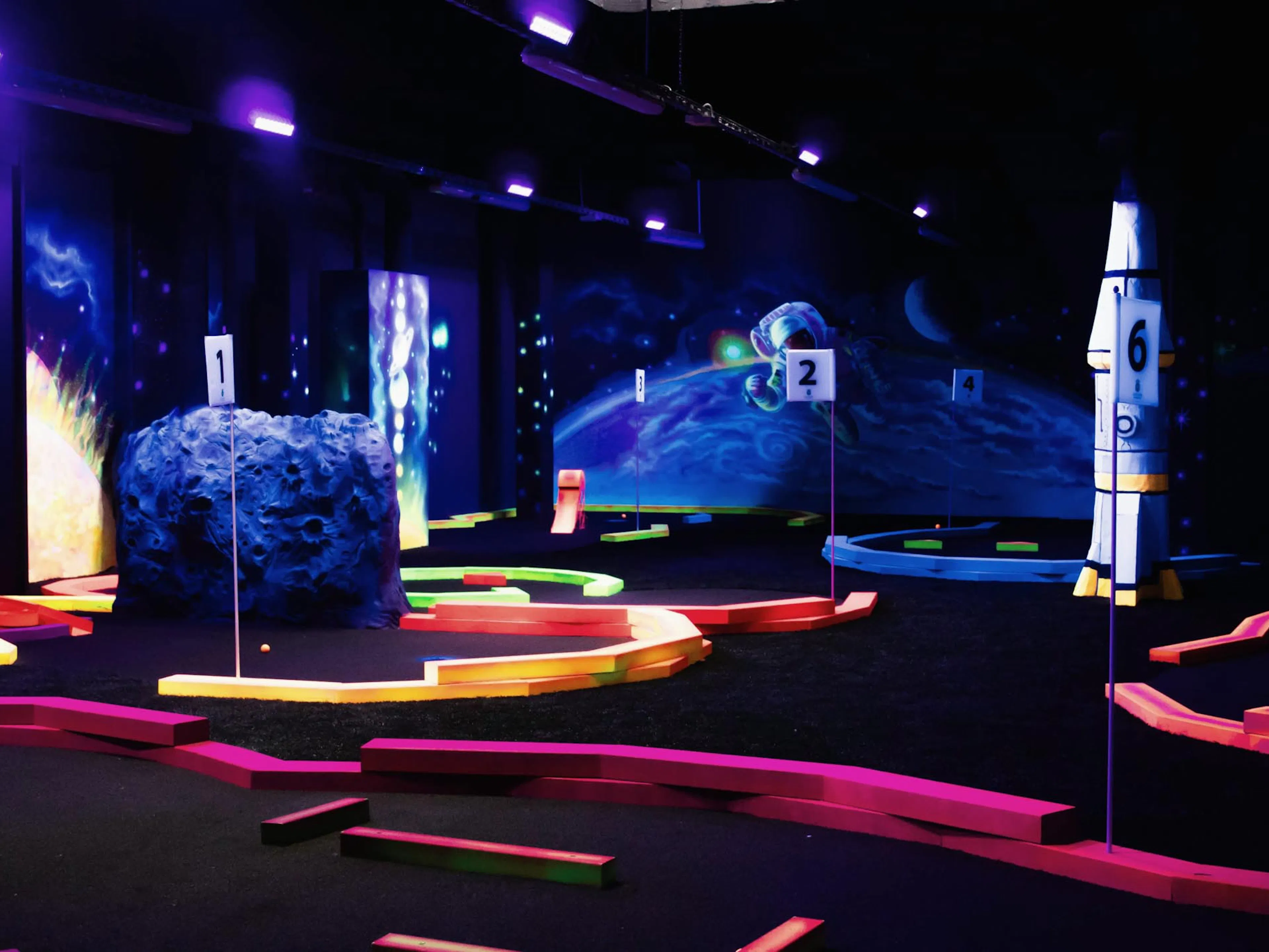 Space-themed mini golf course at The Grand Green – Familux Resort.