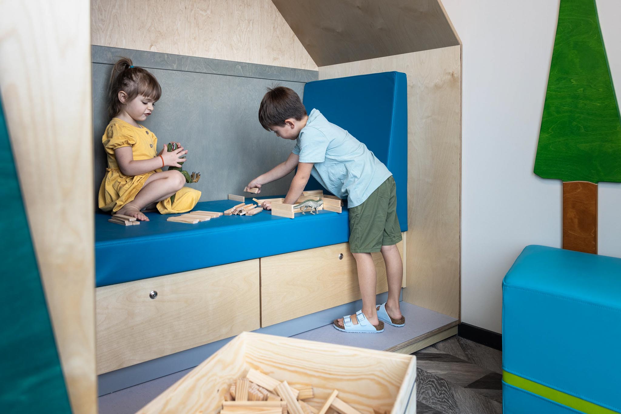 Children playing in the Kids Club at The Grand Green – Familux Resort.