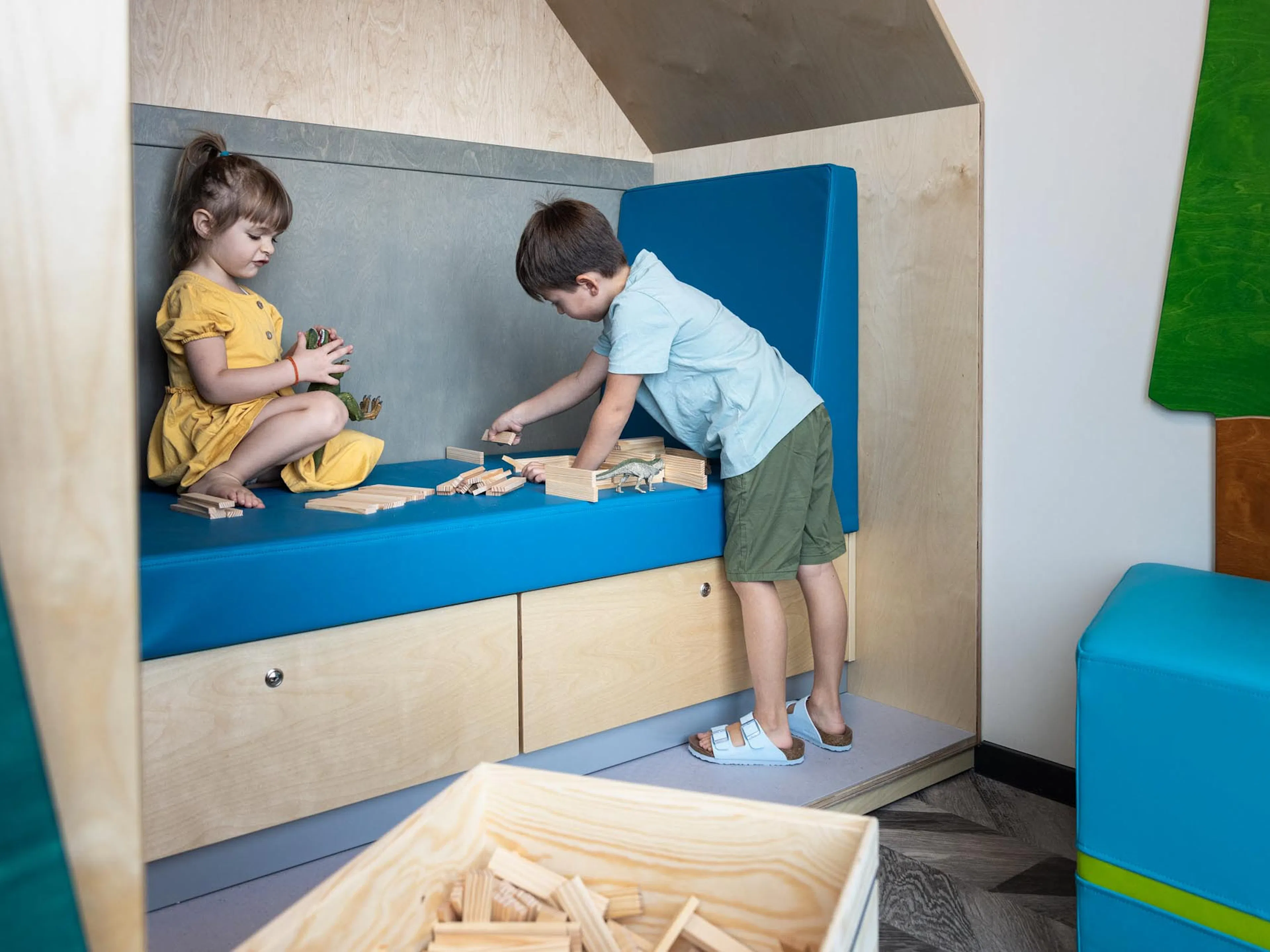 Children playing in the Kids Club at The Grand Green – Familux Resort.