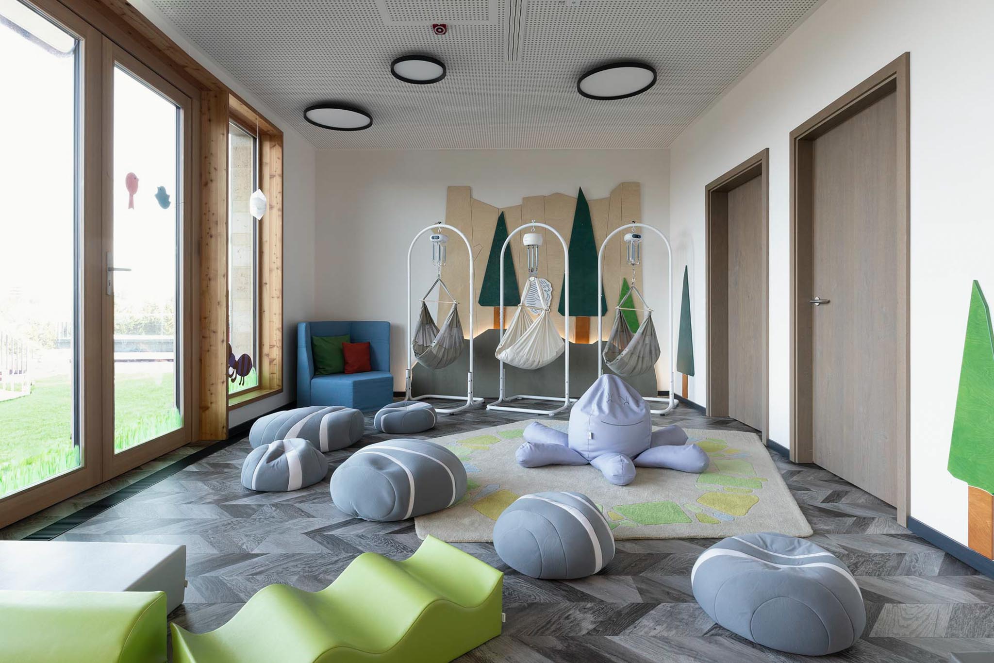 Baby club with child-sized loungers and play facilities at The Grand Green – Familux Resort.