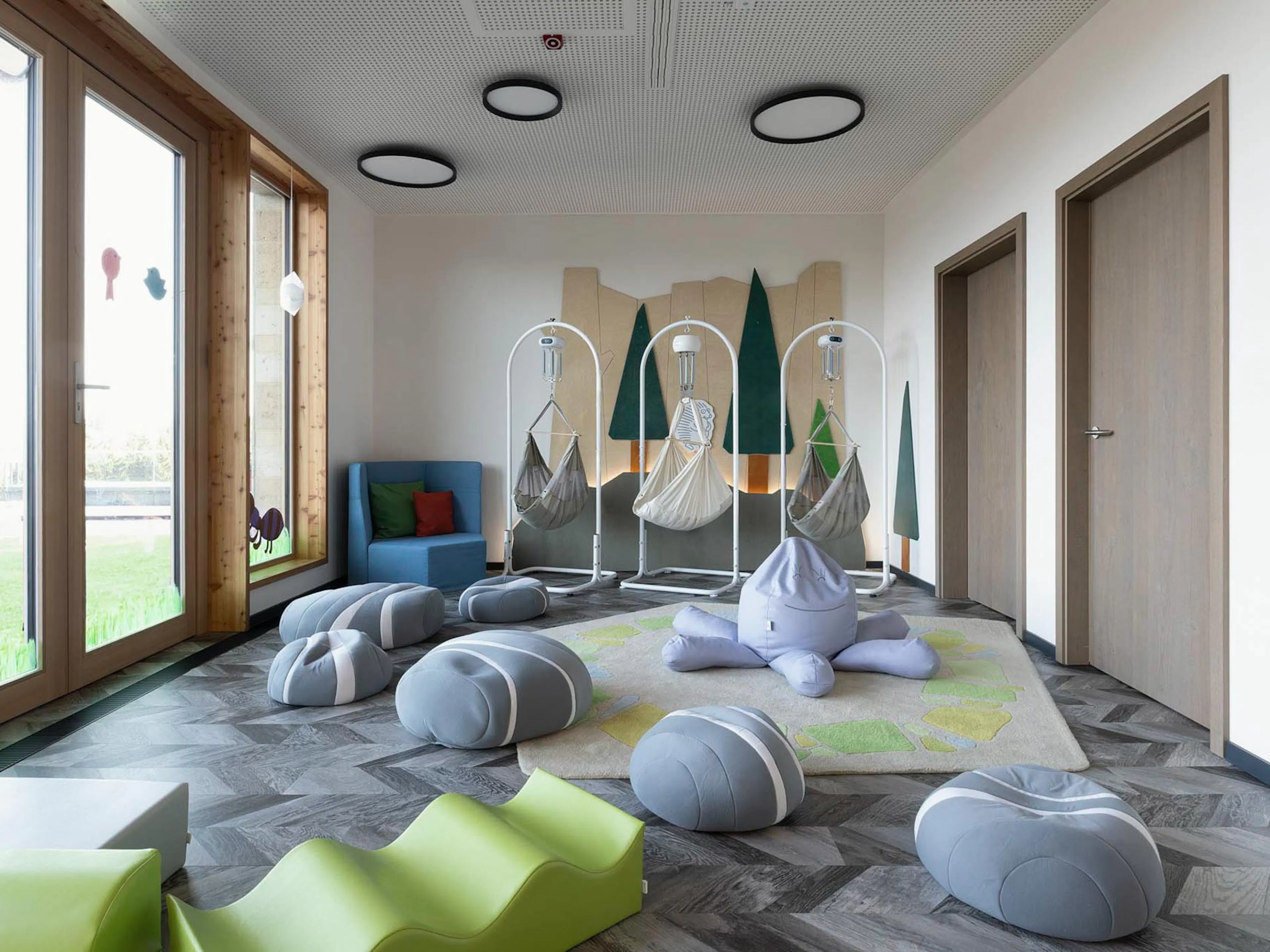 Baby club with child-sized loungers and play facilities at The Grand Green – Familux Resort.