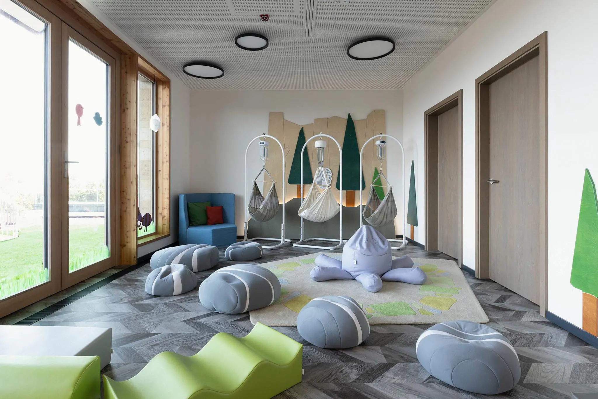 Baby club with child-sized loungers and play facilities at The Grand Green – Familux Resort.
