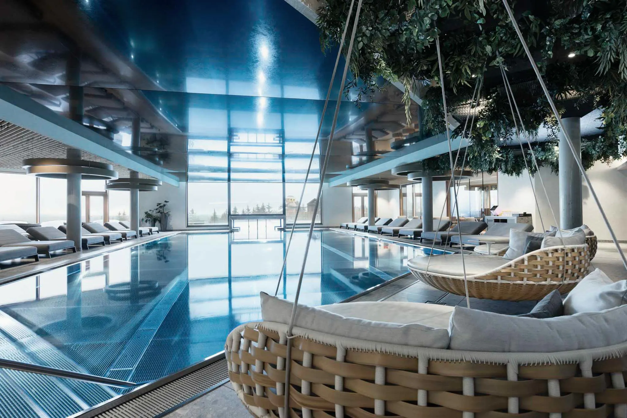 Pool with sun loungers at The Grand Green – Familux Resort.