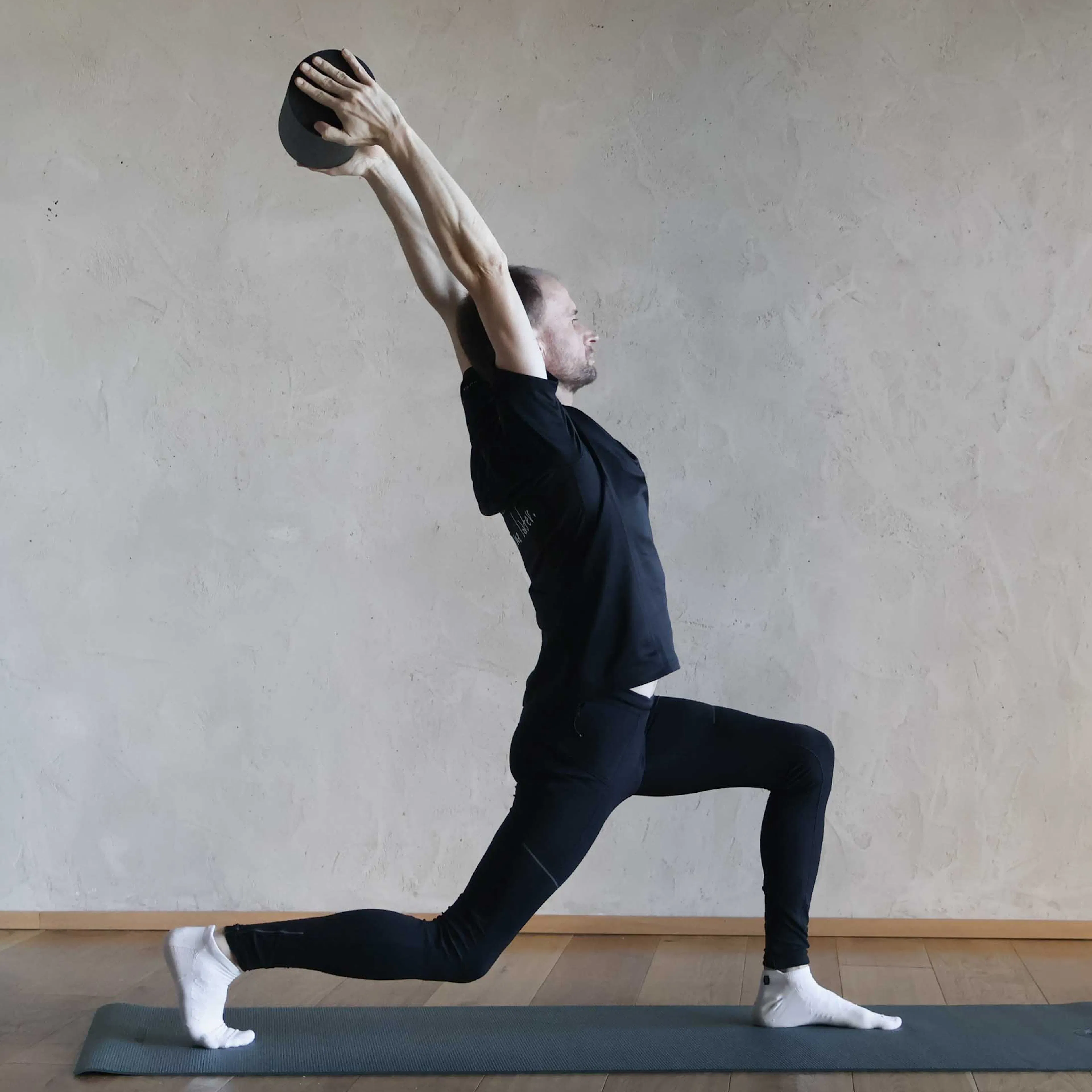 Man doing fascia training in the active studio of a Familux Resort.