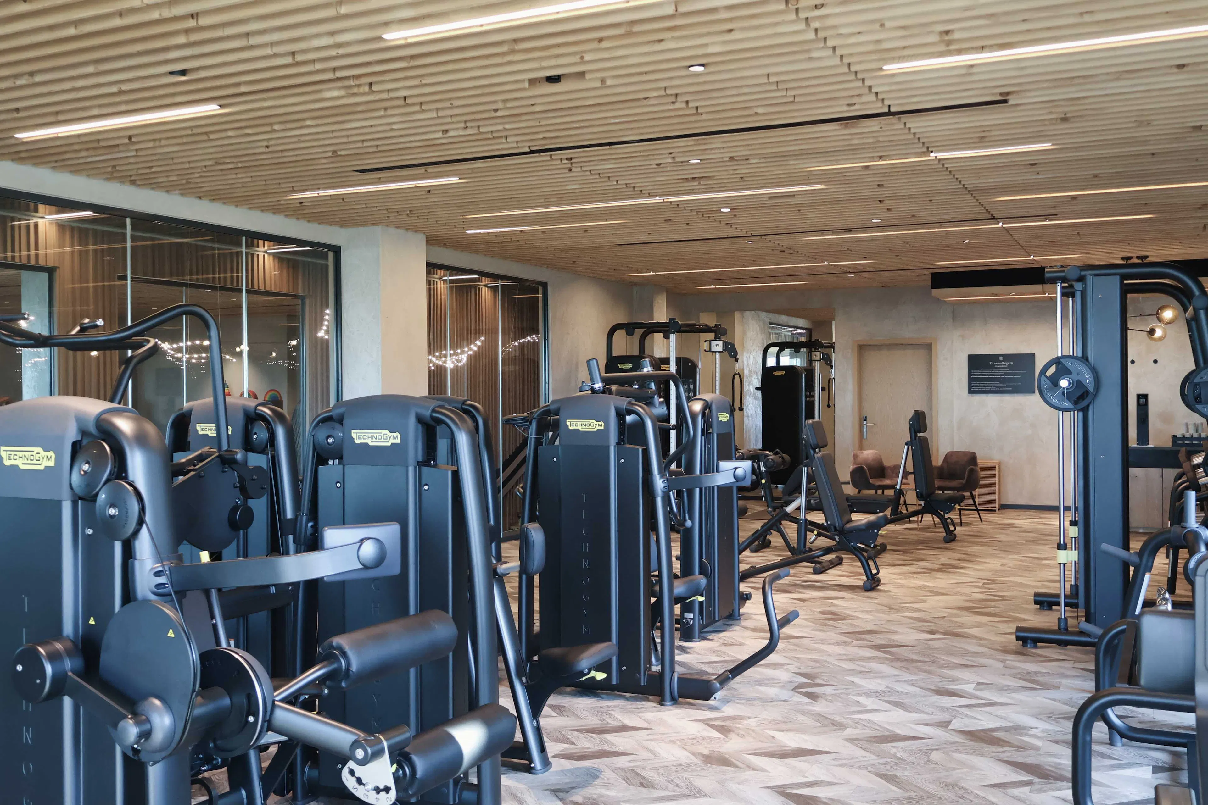 Fitness studio with weights and equipment at The Grand Green – Familux Resort.