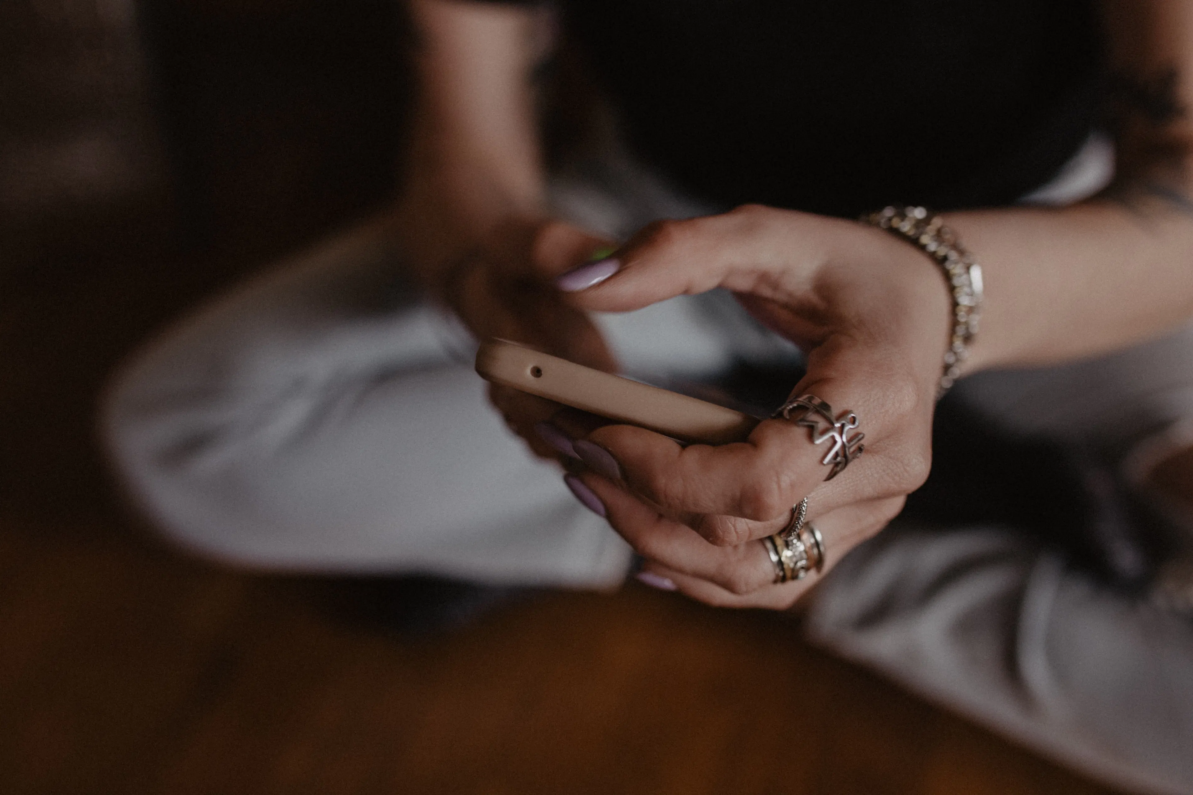 Close-up of a woman using a mobile phone.