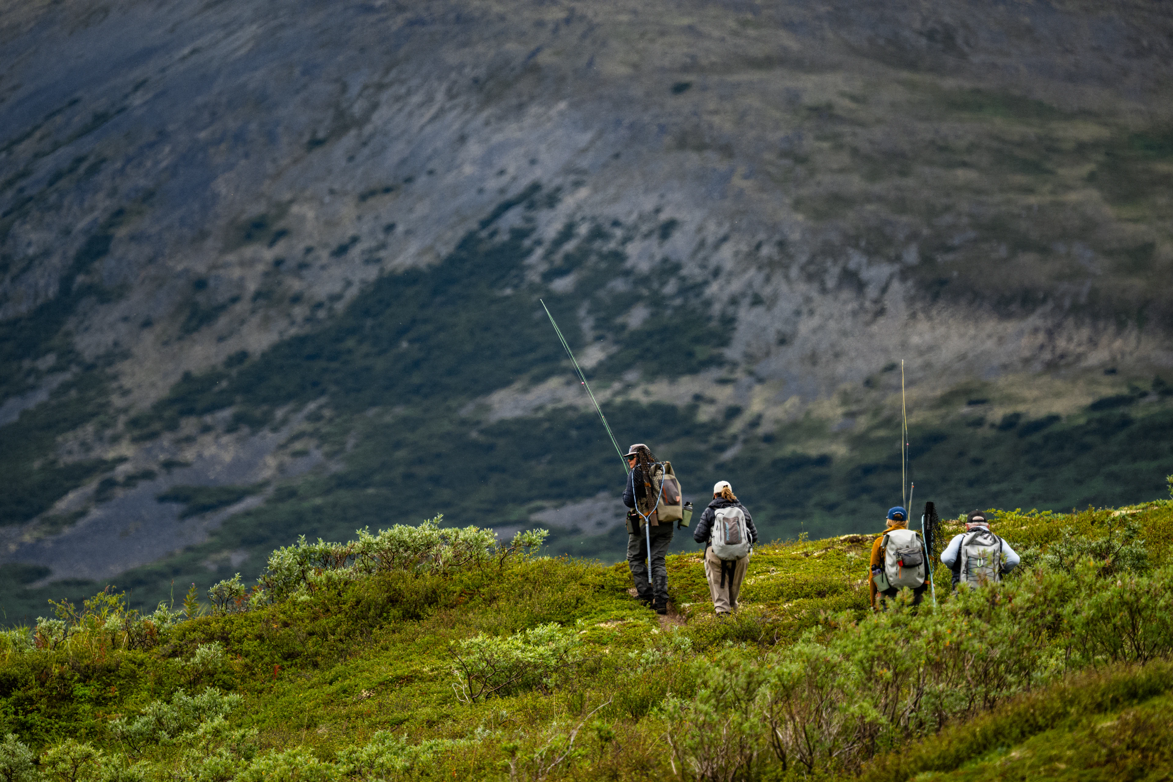 people hiking in katmai national park with The Lodge at 58* North
