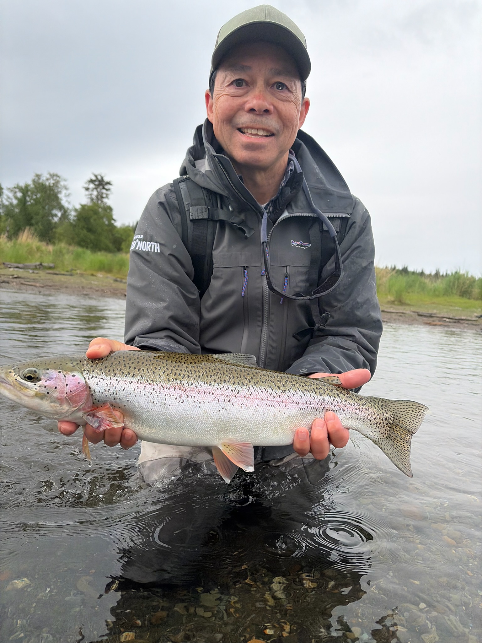 Guided fly fishing on the Naknek River in Bristol Bay during a summer trip with The Lodge at 58* North
