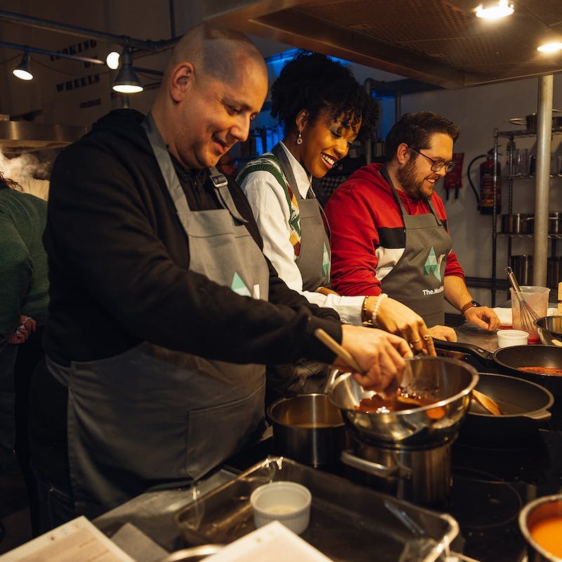Collega's aan het koken bij Next.Gen event.
