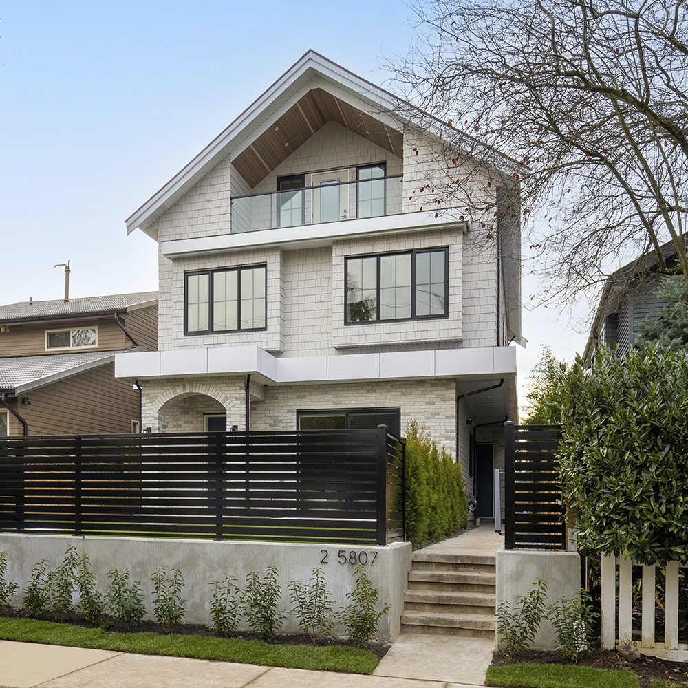 Vancouver multiplex next to an older detached home.