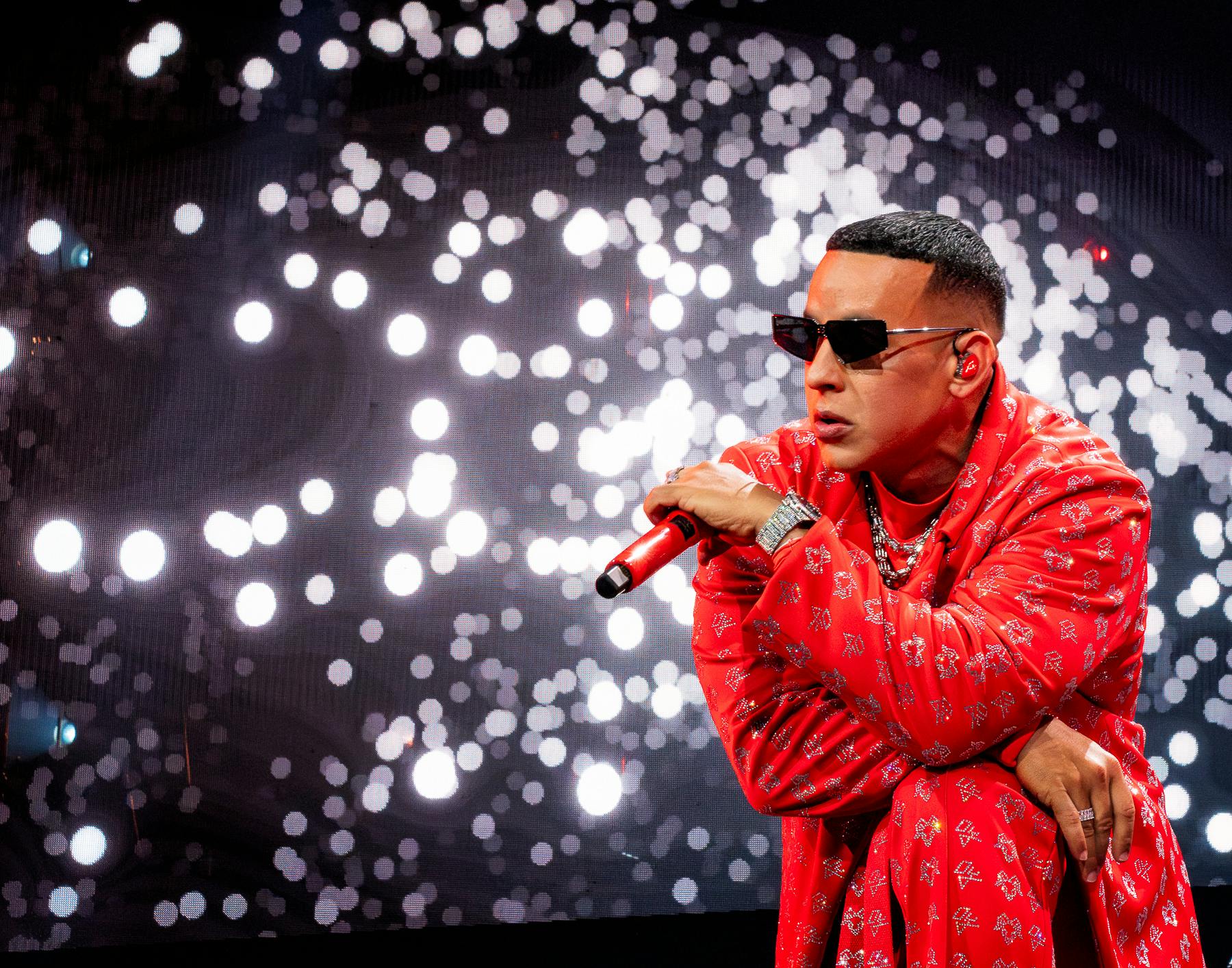 Daddy Yankee With Sparks in Background