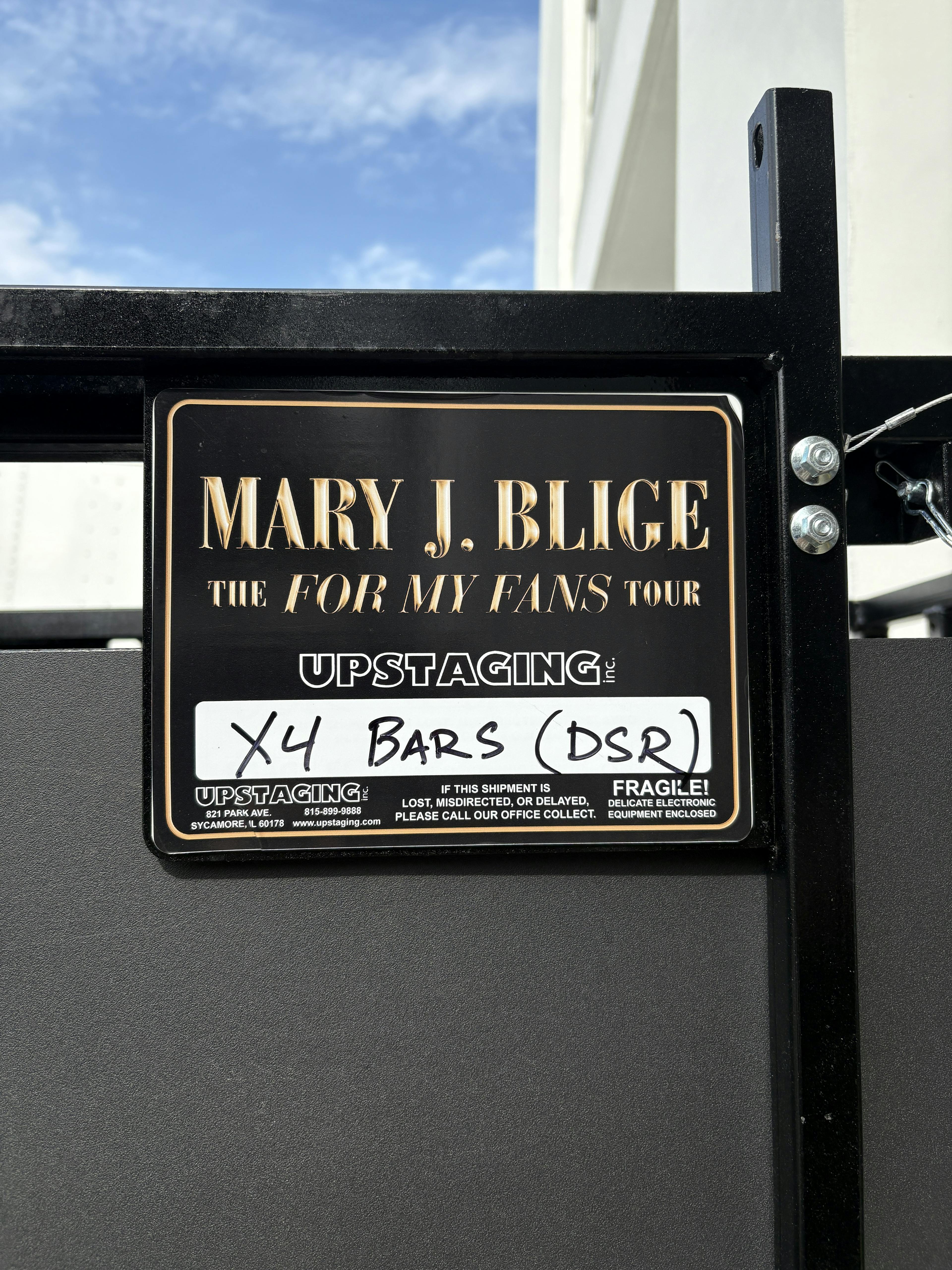 A sign on a set cart backstage for Mary J Blige's touring lights.