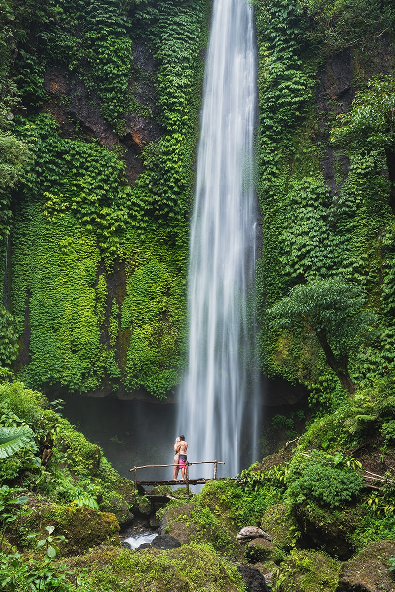 Underneath a waterfall in Bali