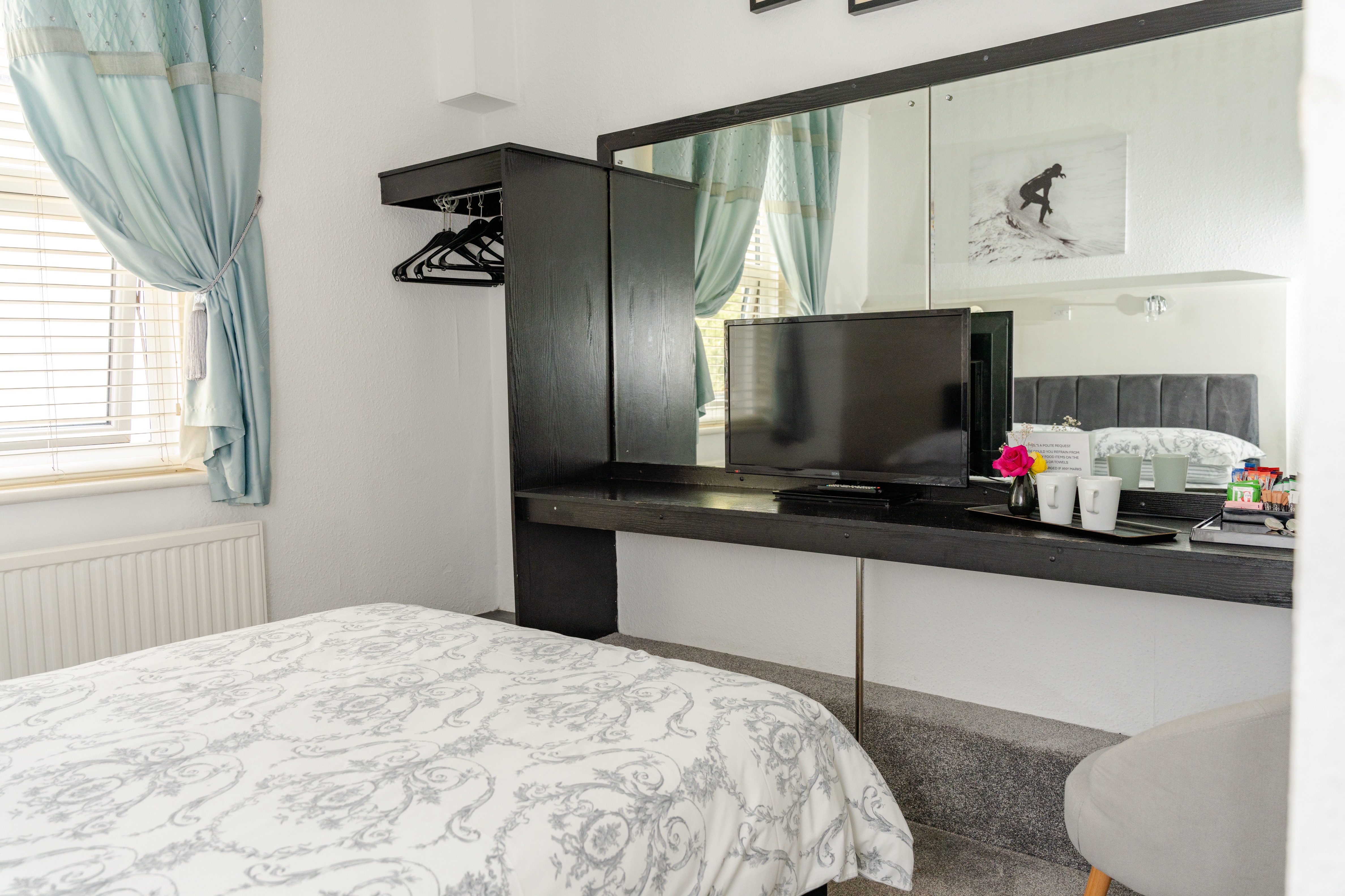 Budget room console table and bed