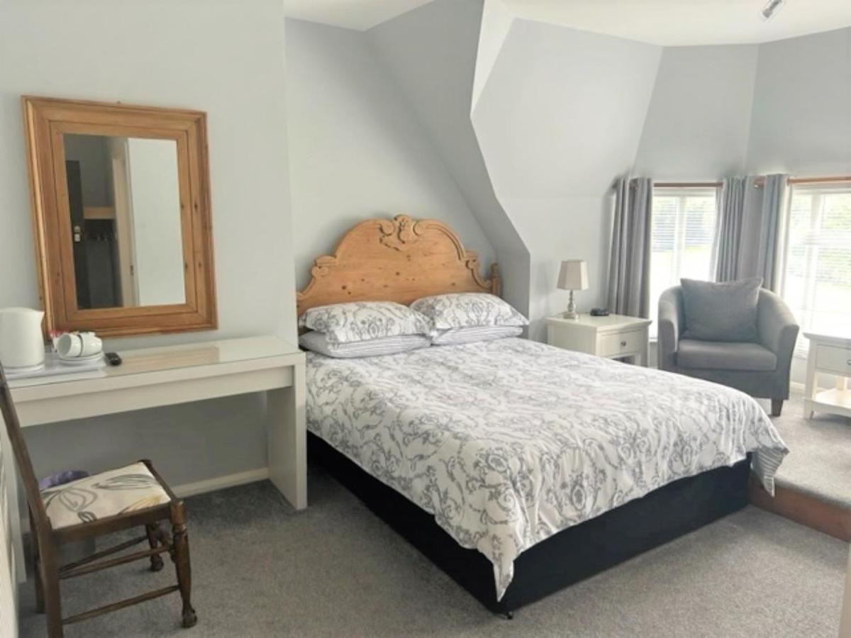 Bed and dressing table in Double bedroom at the The Royal Norfolk Hotel