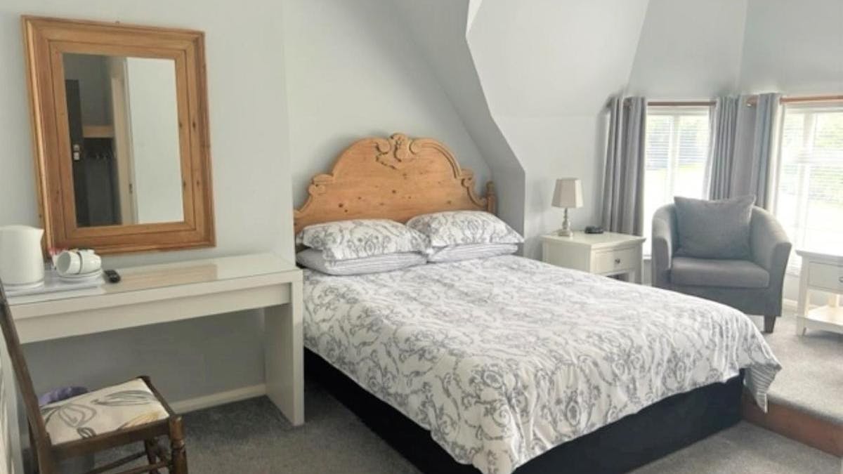 Bed and dressing table in Double bedroom at the The Royal Norfolk Hotel