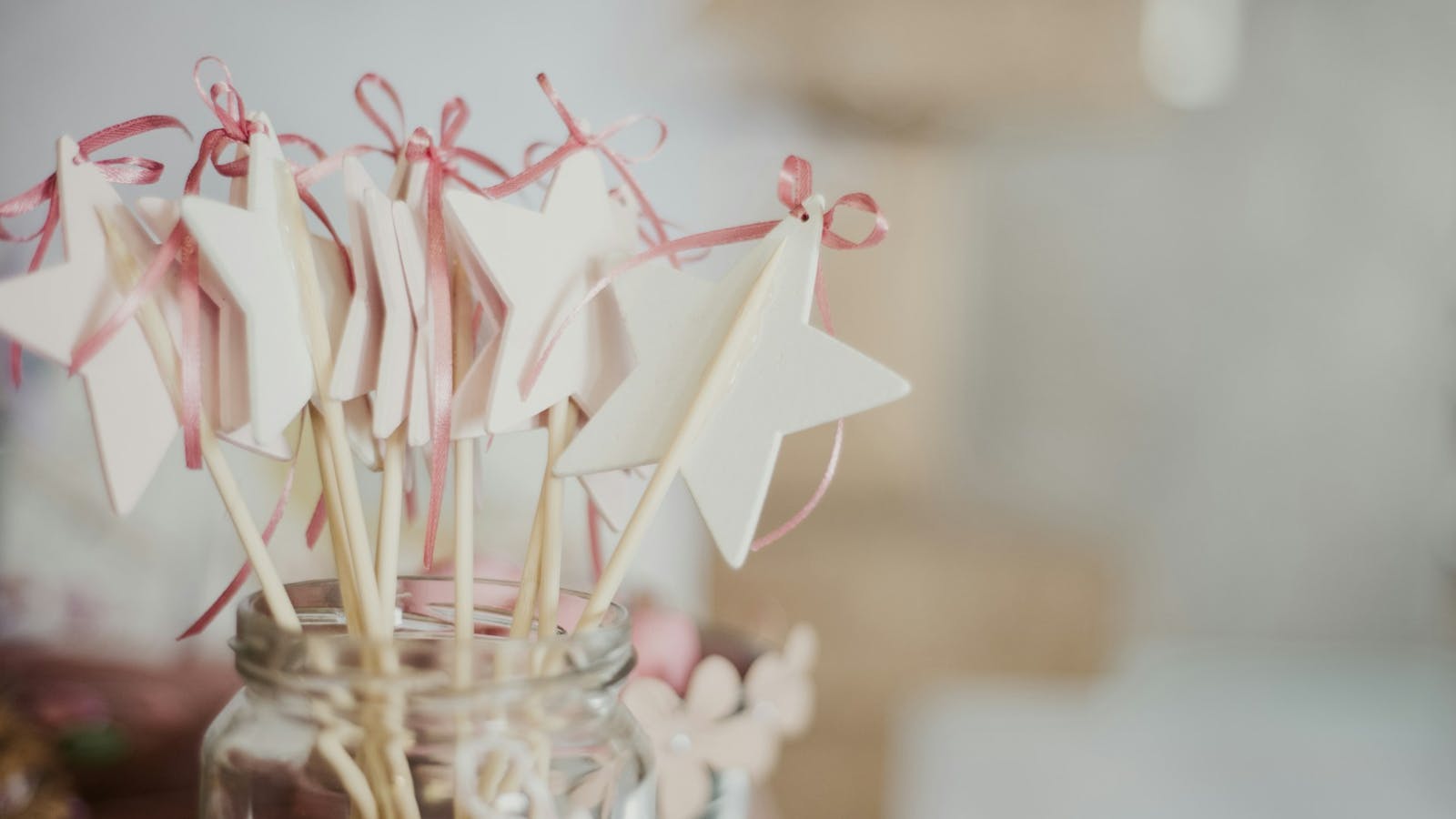 Christening decorations - paper stars in a glass jar