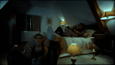 Three people in a room