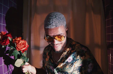 A men wearing flowers