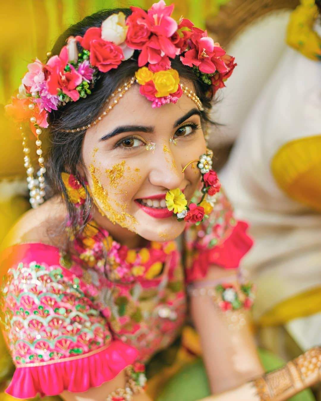 bride with flower jewellery