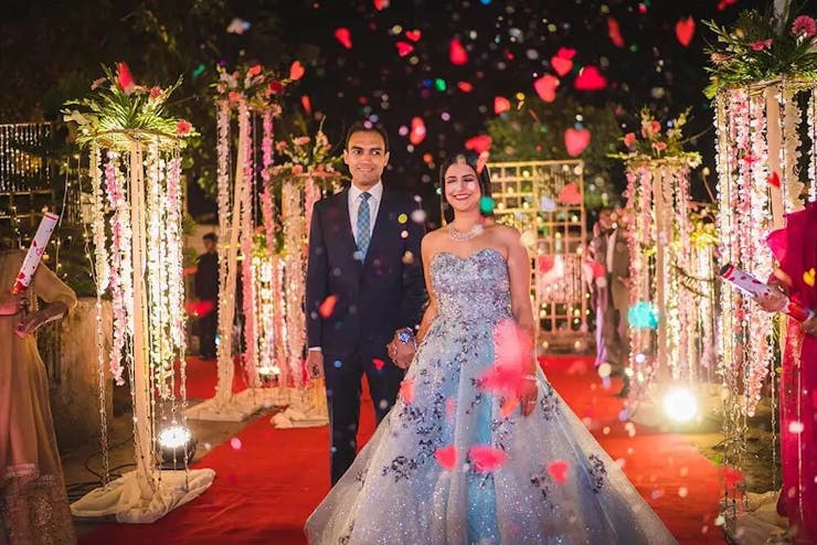 engagement couple entry with flower shower