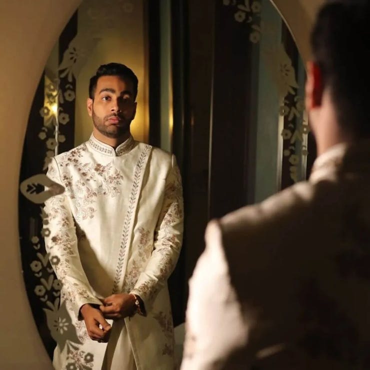 getting ready poses for groom