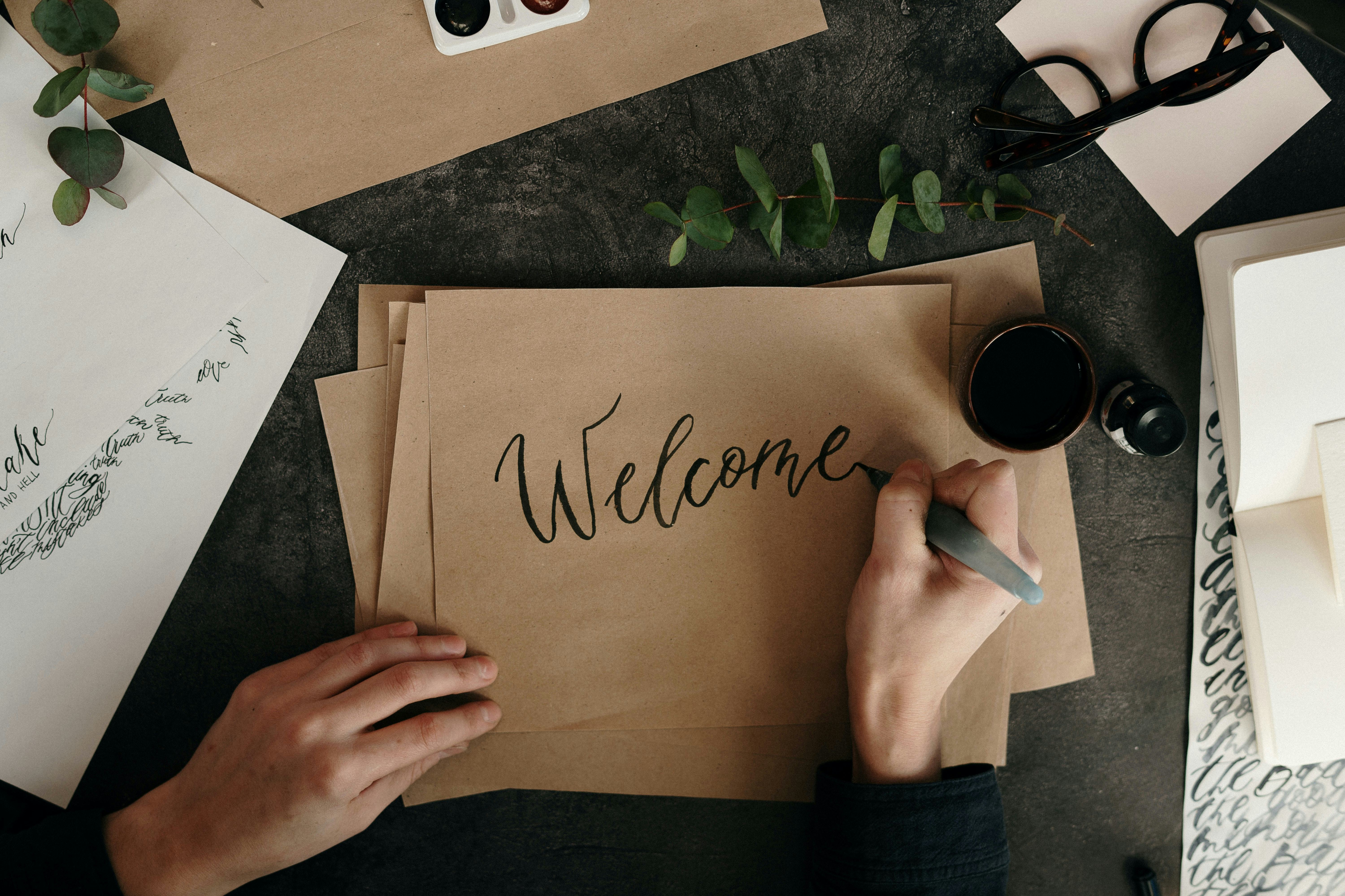 Welcome has been written on brown paper 