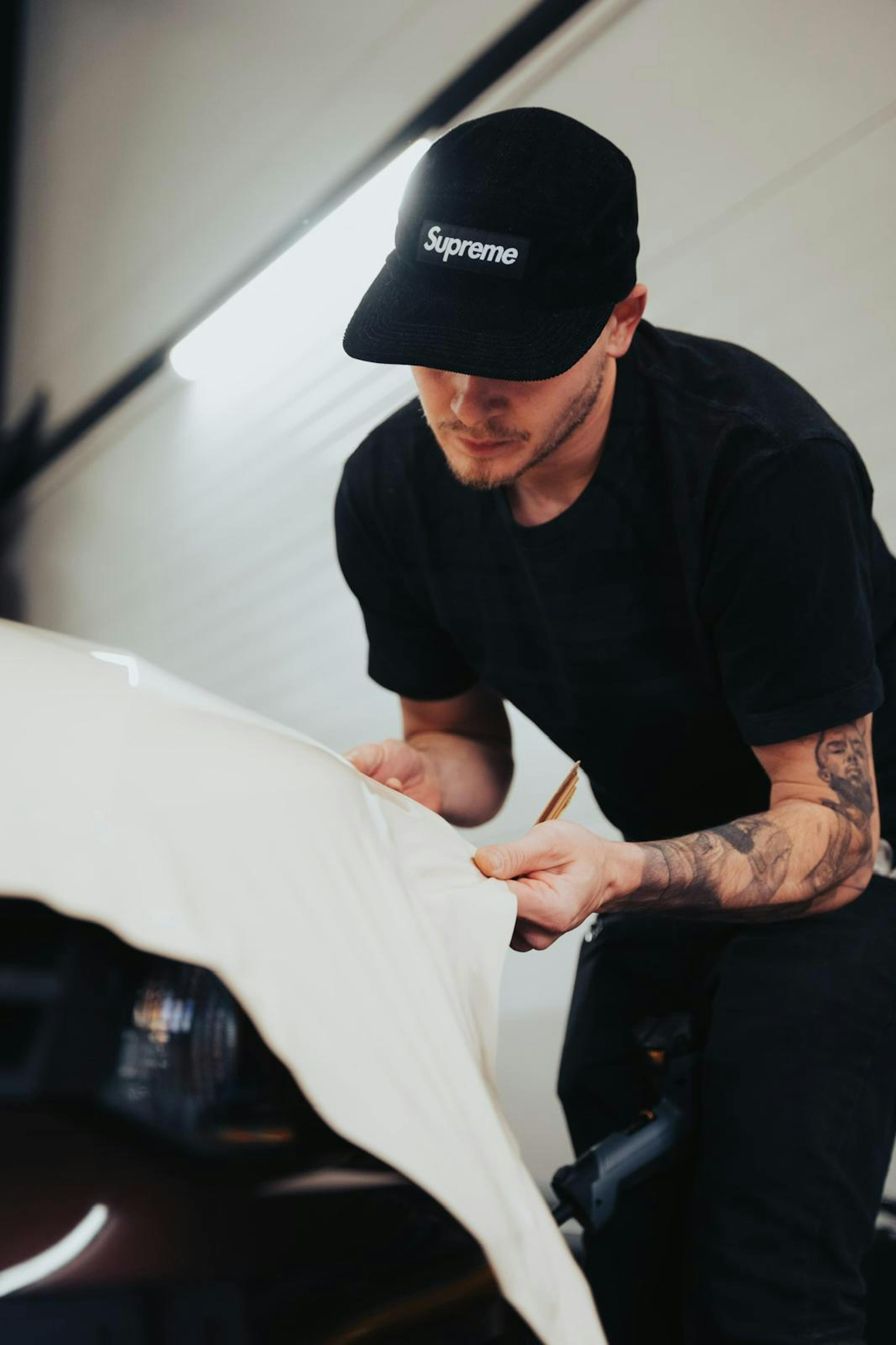 Mark wrapping a hood