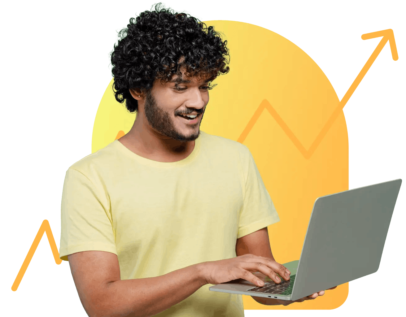 Smiling person typing on their laptop