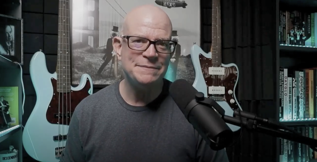 Wesley Evans Smith speaking into a microphone