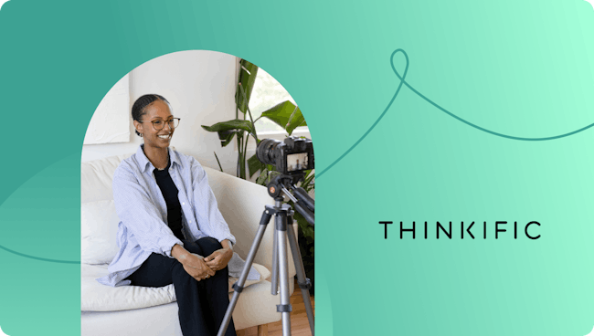 Person sitting down recording a video for Thinkific