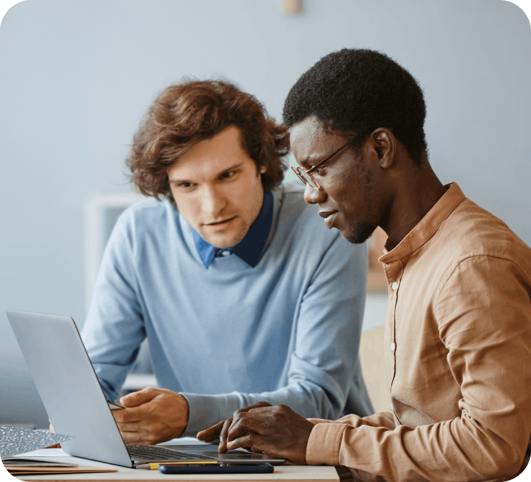 Two people at a computer