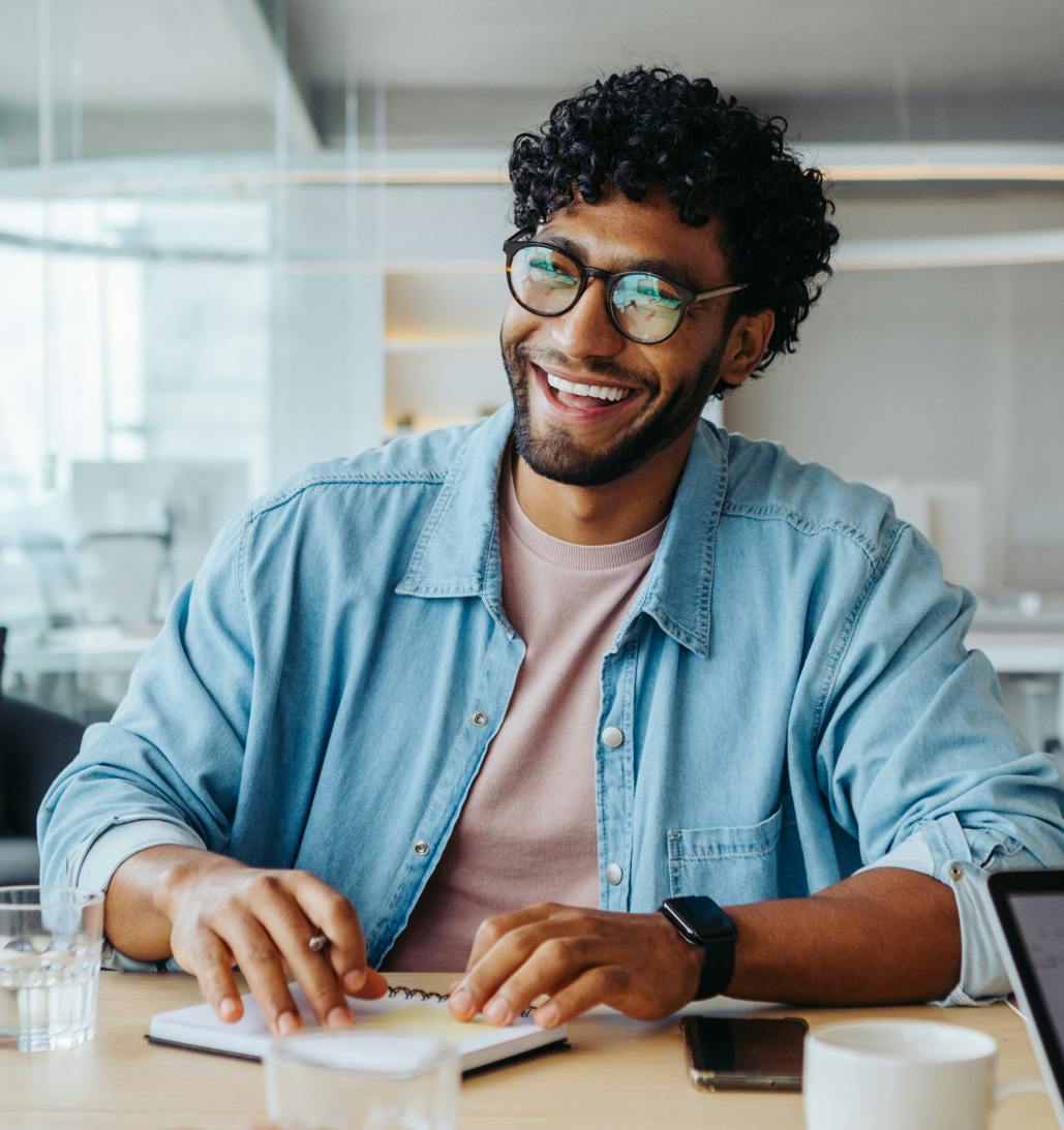 Man writing in notebook