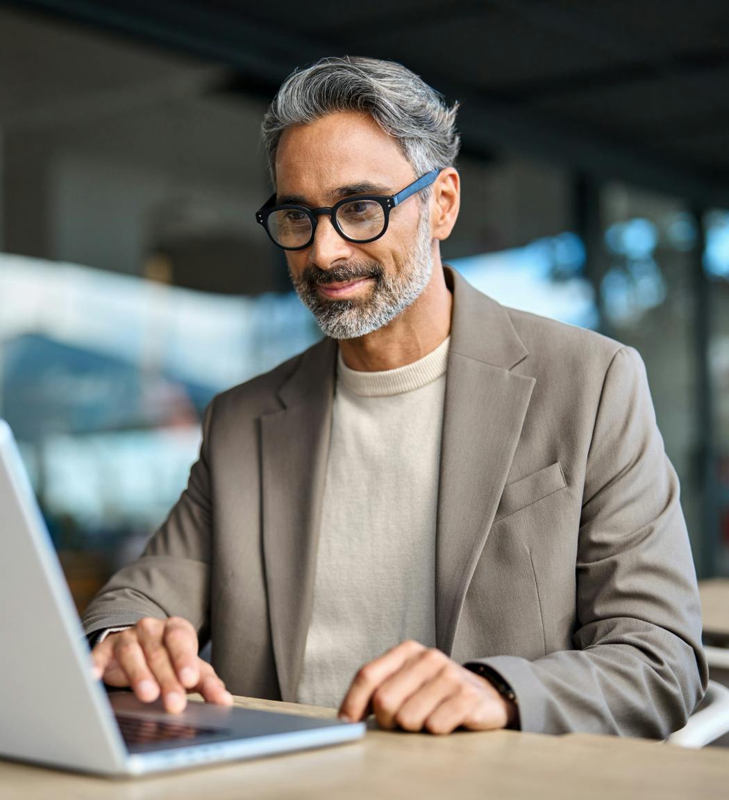 man working at laptop