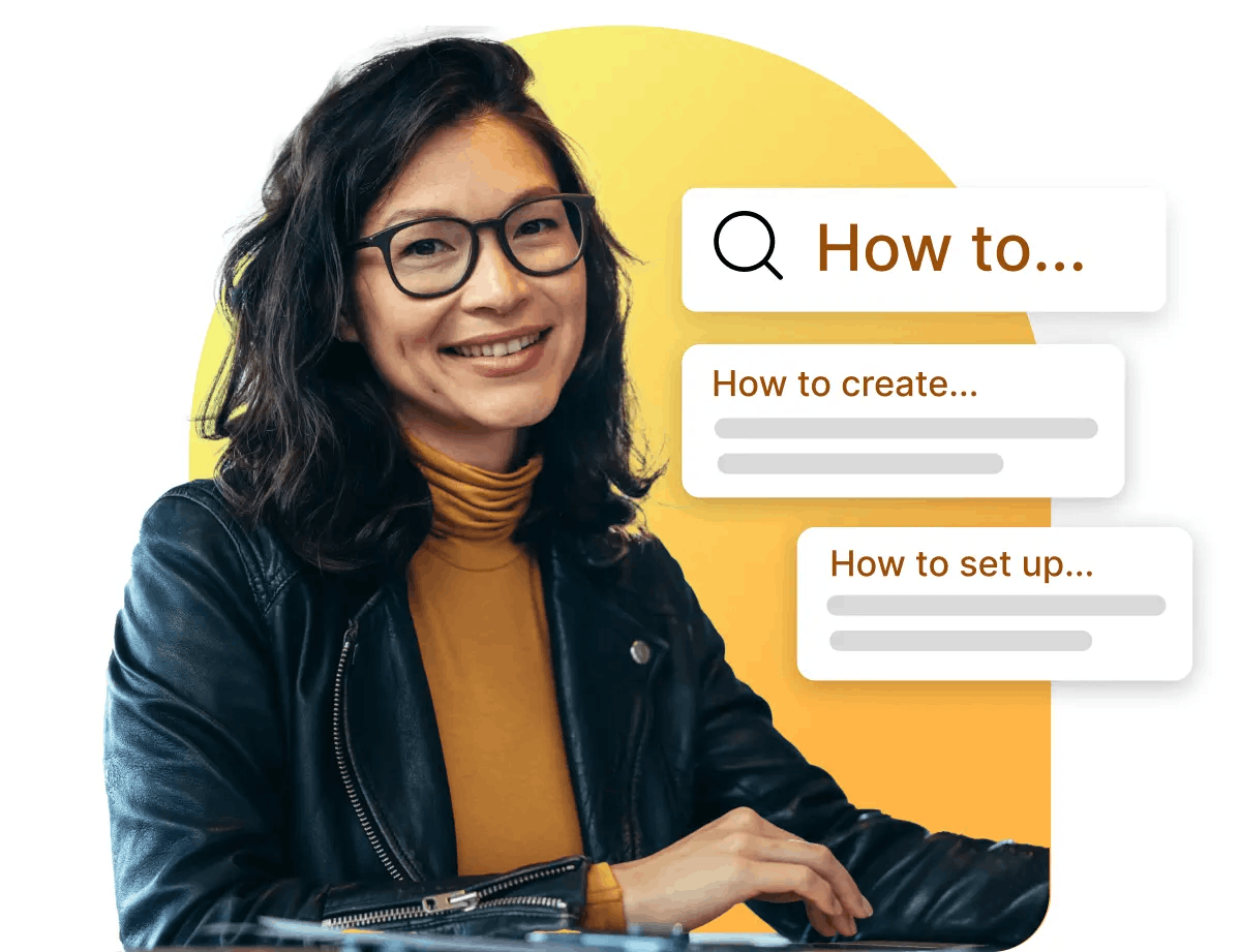 Woman sitting down at desk smiling