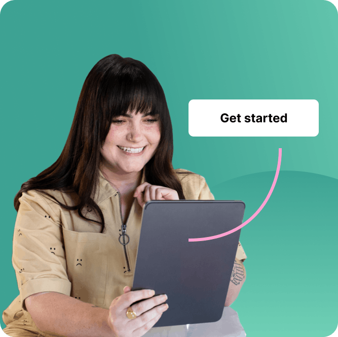 Person smiling while looking at an ipad