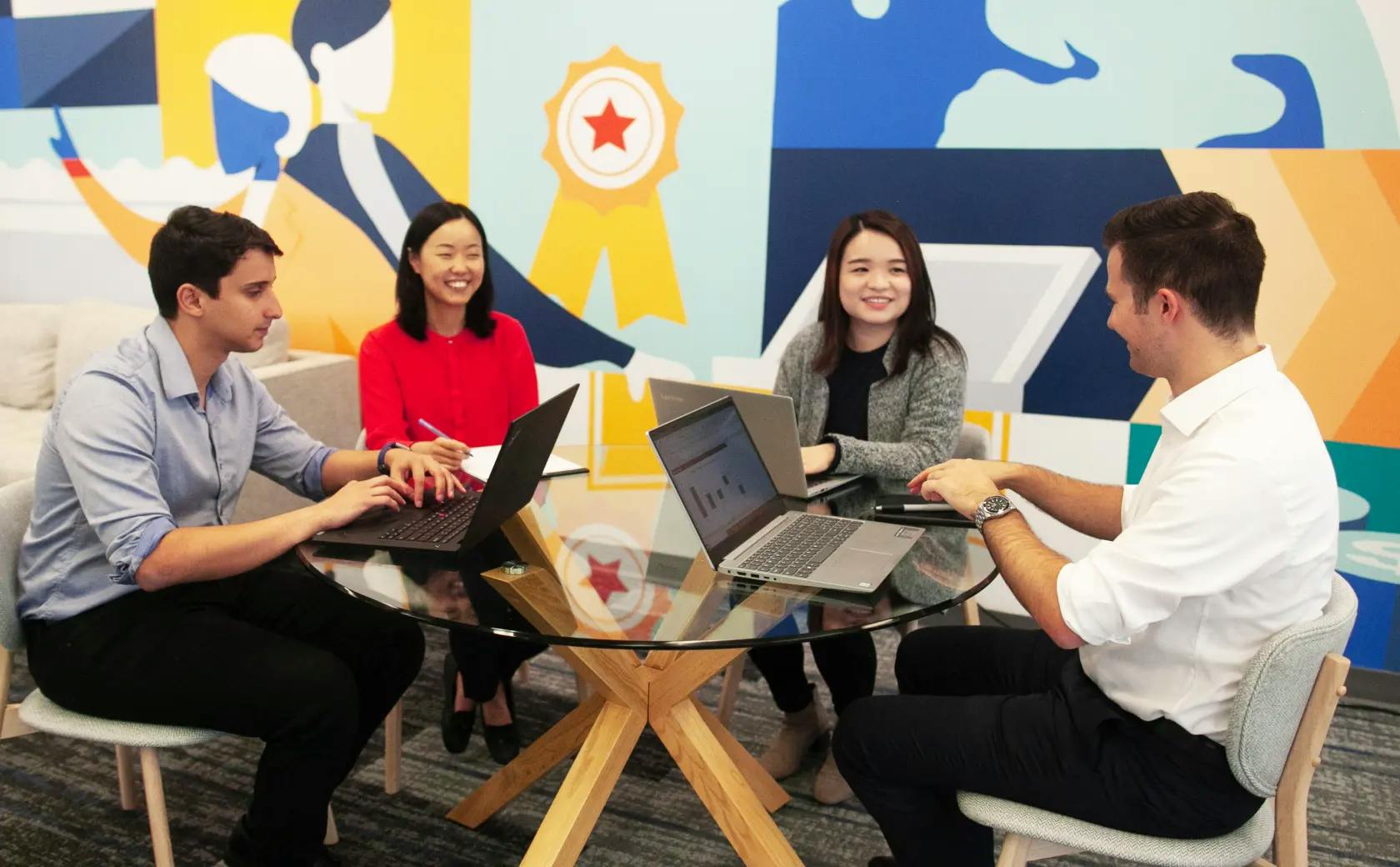 Group of people working together at a desk