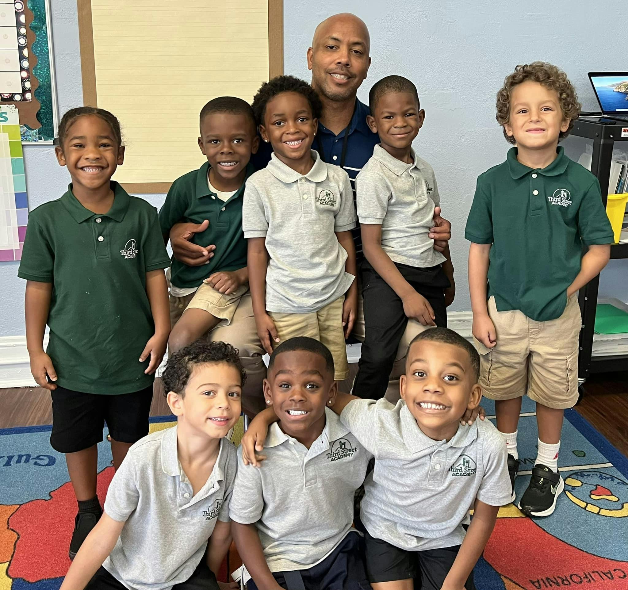 Mr. Milburn with his students