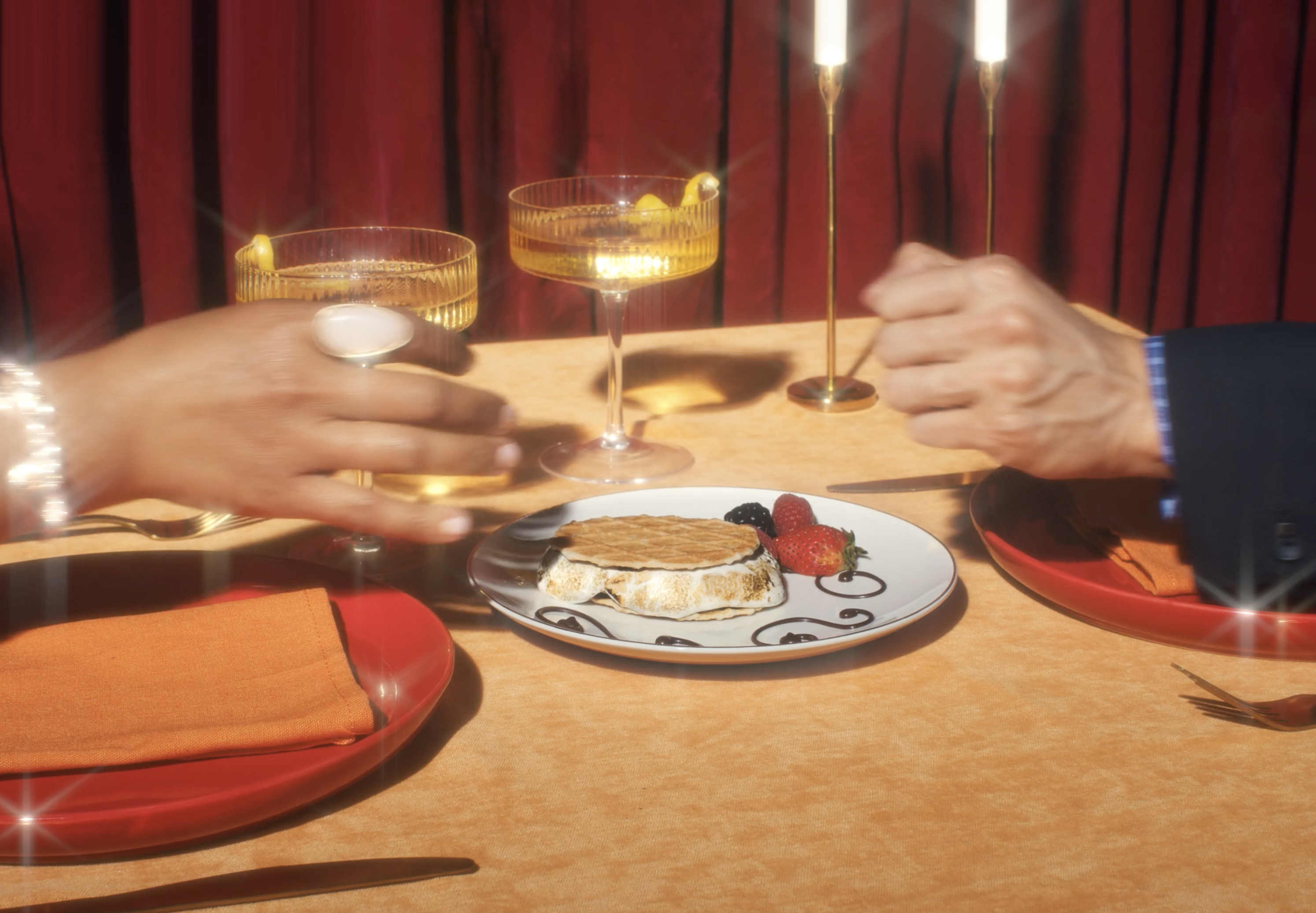 A fancy dinner setting with Stuffed Puff smores as the dessert