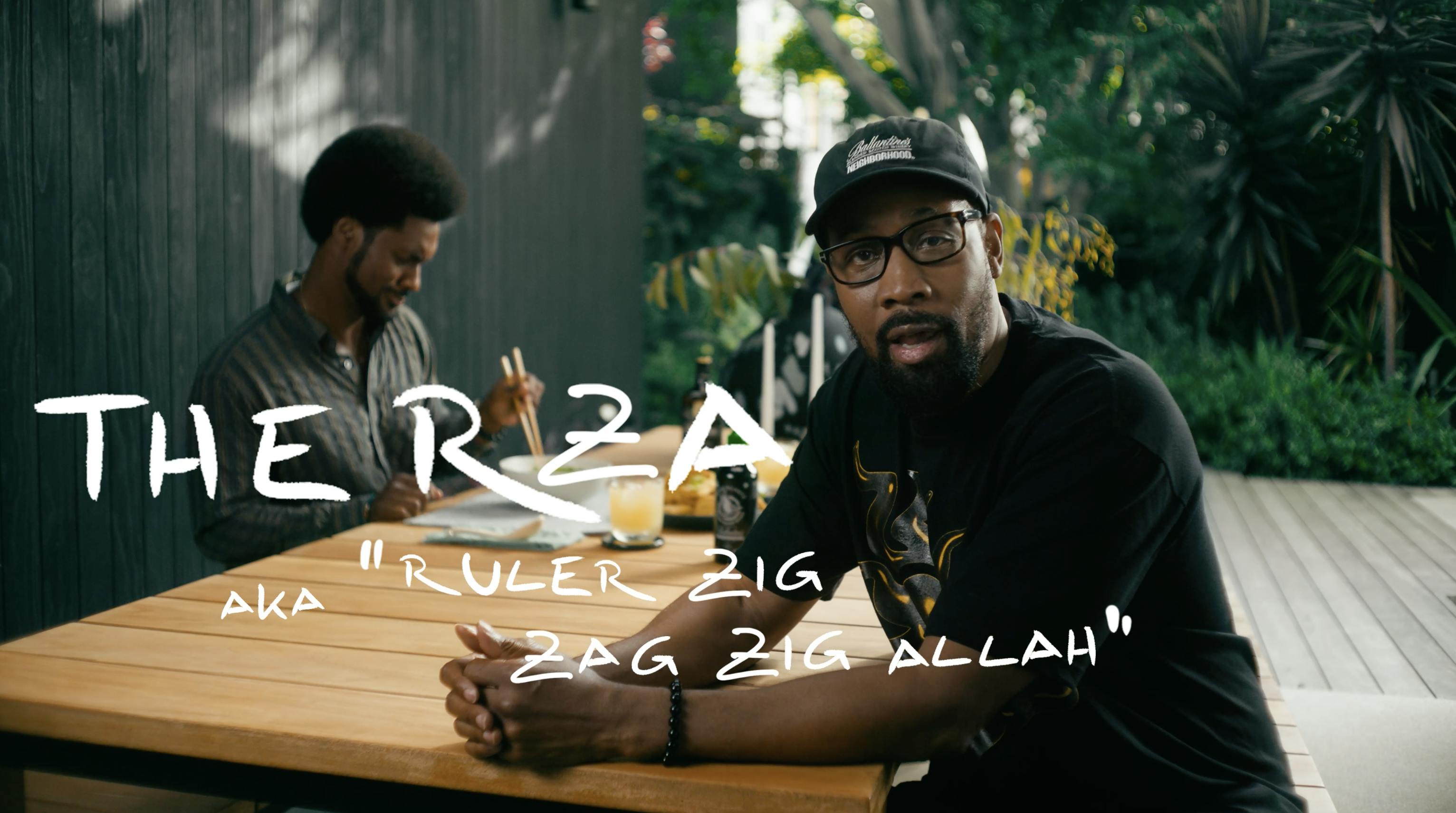 A man (RZA) looks into the camera with the text "The RZA A.K.A "Ruler Zig Zag Zig Allah"