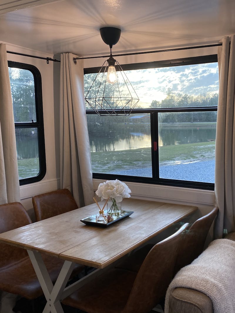 A view out an RV window of a lake in Vinton, Louisiana.