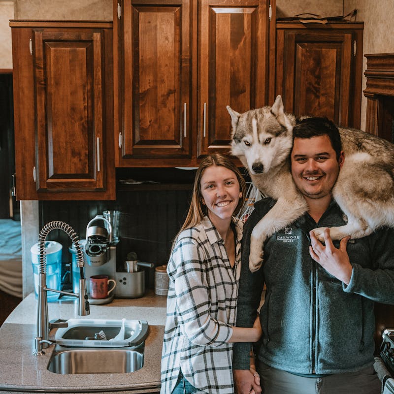 Jessica Shaw and her boyfriend Nico, with a husky on Nico's shoulders