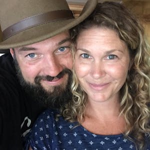 A head shot of Jeremy and Stephanie Puglisi posed next to each other.
