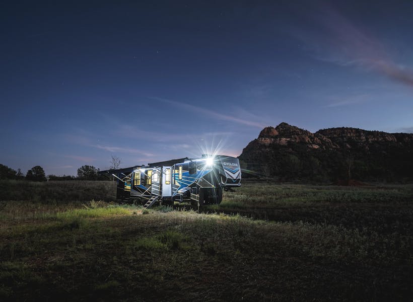 A heartland cyclone fifth wheel at night