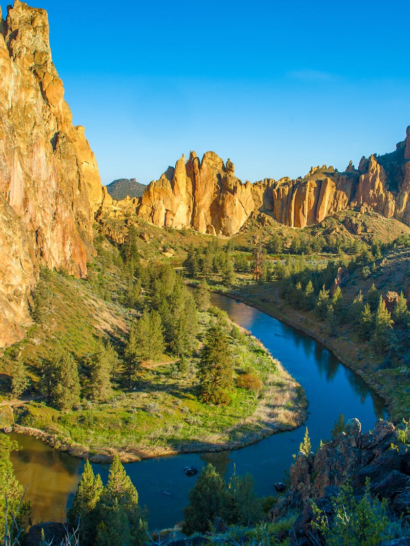 A river running through a valley of mountains.