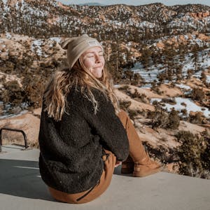 Jessica Shaw sitting on top of her RV.