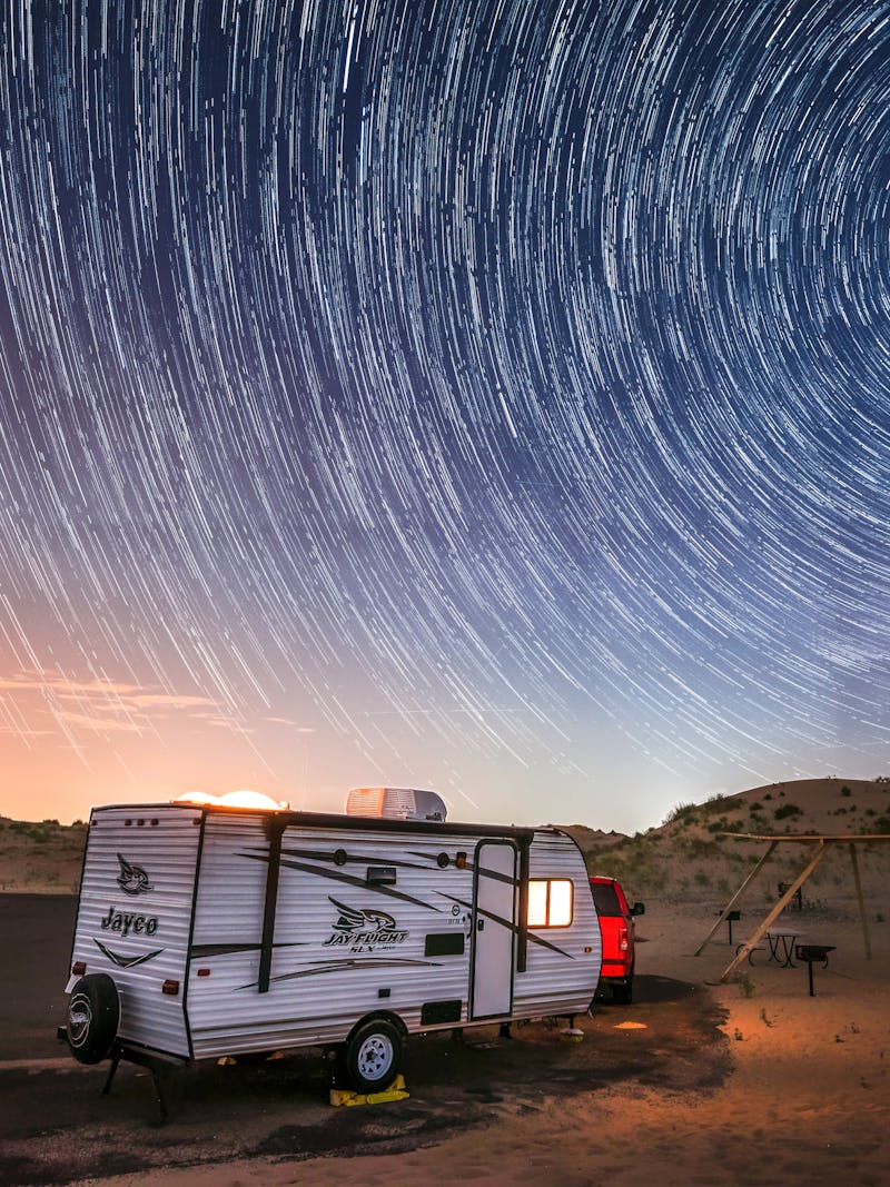 Alison Takacs's Jayco Jay Flight parked at a campground as the sun rises.