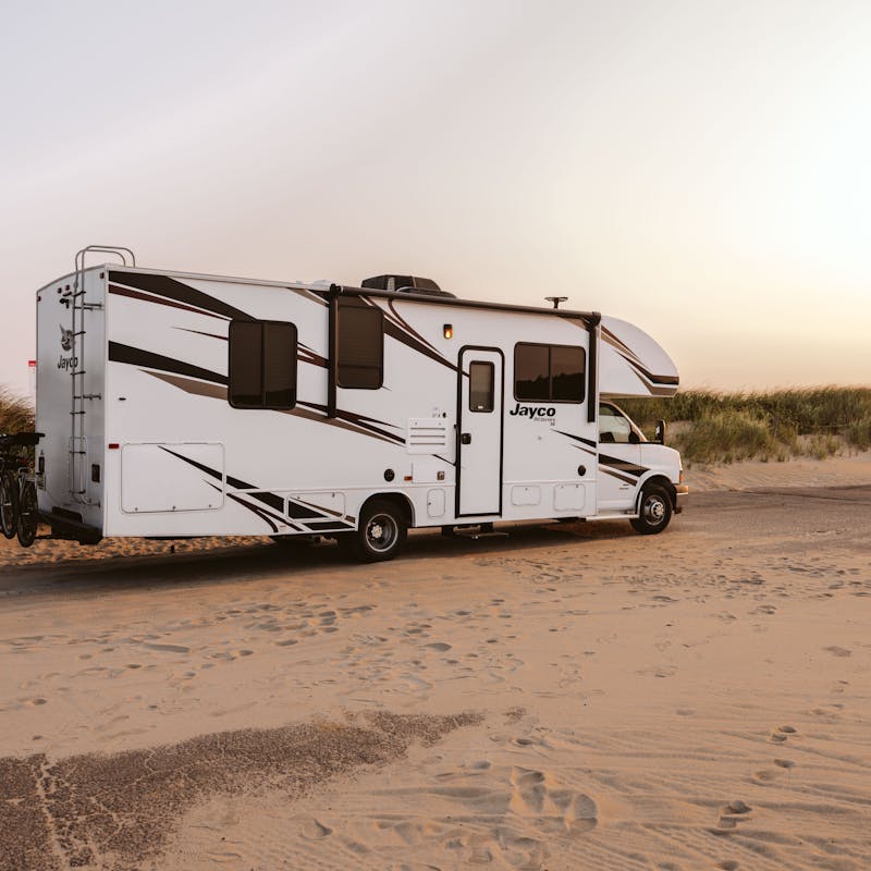 Sonya Lowery's Jayco Redhawk parked by the ocean.